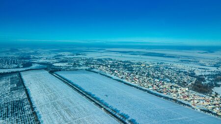 Aerial or top view from a drone on a highway in winter weatherの写真素材
