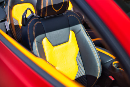 View of the interior of a modern automobile showing the dashboard. Tuning. Supercar. Karbon. Europe....