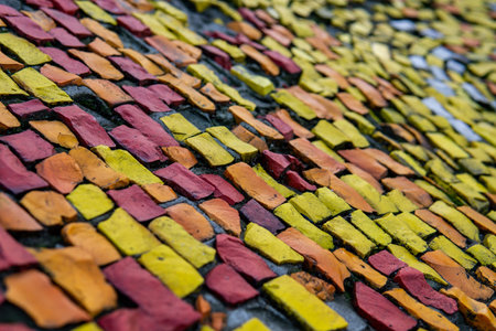 Fragment of an old wall color mosaic close-up. Smalt..