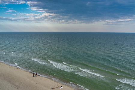 Sea view from tropical beach with sunny sky.