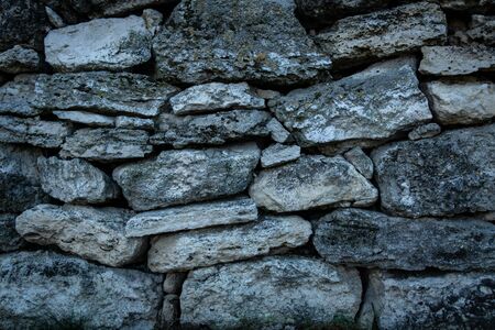 Background of stone wall textureの写真素材