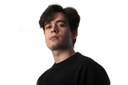 Portrait of Young Man on White Background.の写真素材