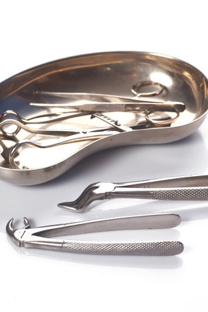 Dental appliances in sterile packaging on white background ..