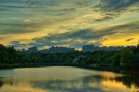 Autumn Sunset On The Lake Beautiful scenic view of the red sunset over a lakeの写真素材