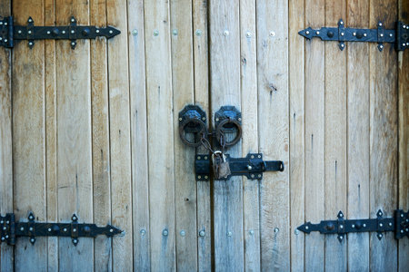 Old Wooden Gate With Padlocks. Retro design.