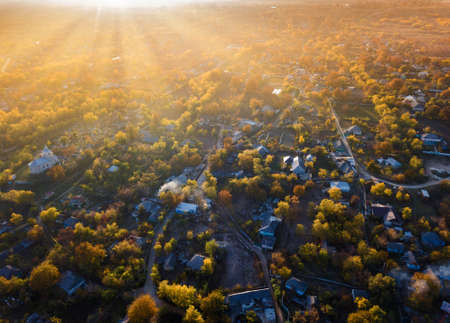 Panorama scenic aerial green little village at sunsetの写真素材