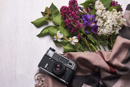 Bunch of Lilac Blossom and old camera Isolated on Whiteの写真素材
