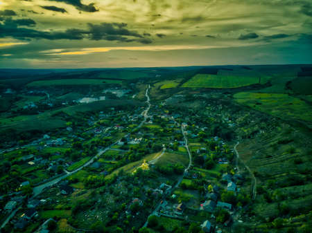 Beautiful sunset above the small rural villageの写真素材
