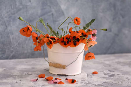 A Little Red Poppies Bouquet Arranged In Classical Styleの写真素材