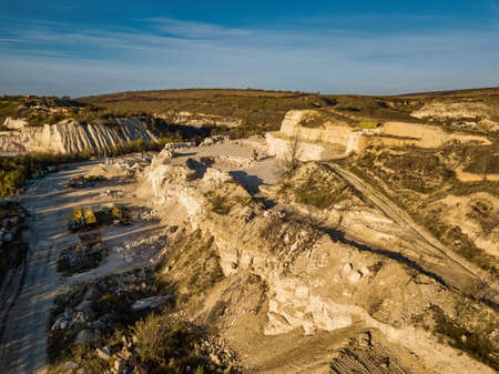 Stone Quarry Aerial. Heavy machinery working at stone qaurry.の写真素材