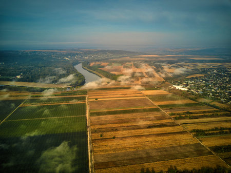 Aerial view on the field during sunset. landscape from drone. Agricultural landscape from air....