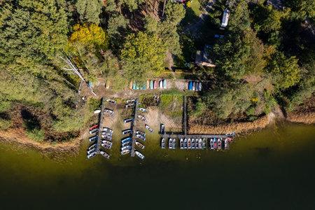 Drone footage of a pier with boats lined up in Lake. Germany.の写真素材
