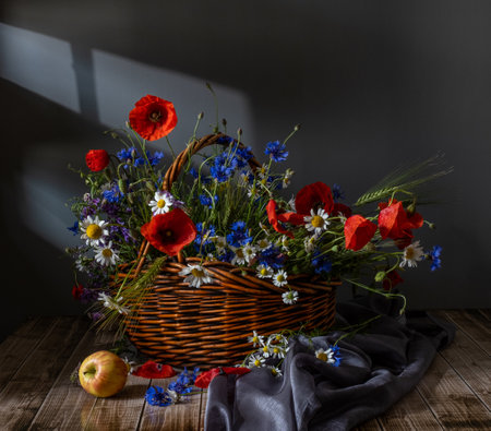 Still life with red poppies and wildflowersの写真素材