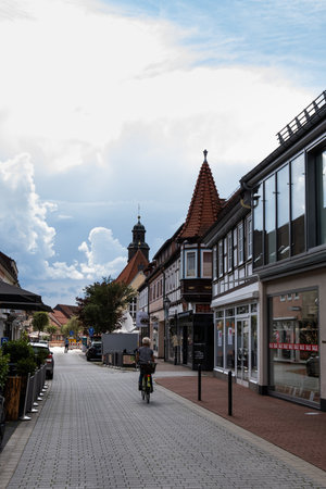 SondeBad Lauterberg, Germany - August 04, 2023: the street Hauptstra e with shops and cafes on a sunny summer day with cloudy sky - a hill of the Harz mountains can be seen in backgroundrhausen old german gothic town near Erfurt. Tipical german architectuのeditorial素材