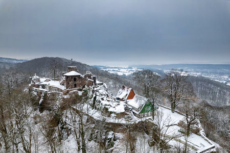 Aerial view ruins of old castle. Winter. Ruin of Hohnstein Castle, Harz mountains, Germany.の写真素材