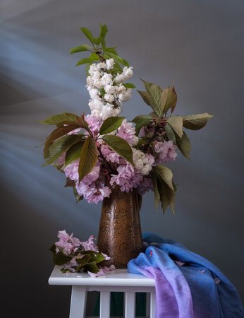 A beautifully serene spring floral arrangement showcasing delicate pink blossoms. Sakura flowers.の写真素材