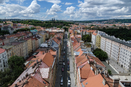 Breathtaking panoramic view of Prague, showing its historic city center with iconic buildings, charming red-roofed houses.の写真素材