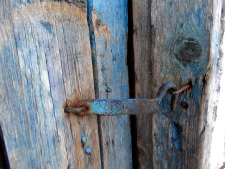 Old hook, door, lock, hook. Old dilapidated door.の写真素材