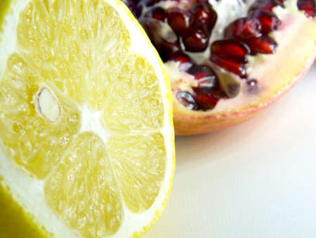 Lemon close-up on a pomegranate background.の写真素材