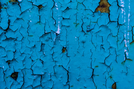 Rust showing through metal paint.