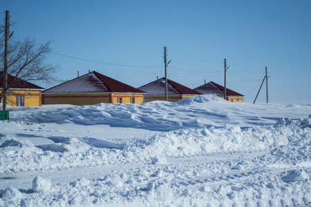 New brick houses without owners swept away by snow.の写真素材