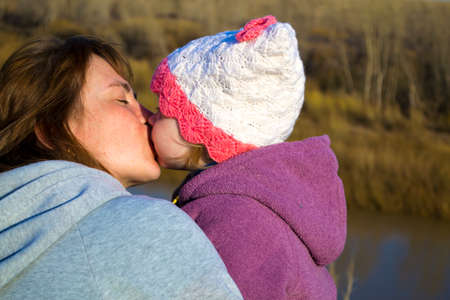 Mother and daughter luxuriant in nature, a sense of love.の写真素材
