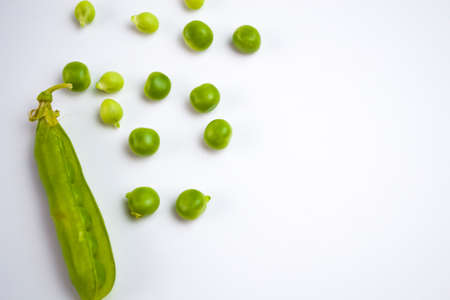 Green peas on a white background, your dietary lifestyle.の写真素材