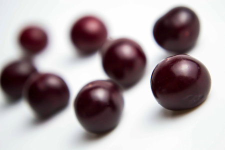 Cherry kernels on a white background, cherry close-up.