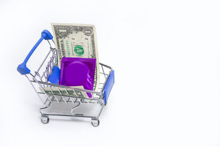 A condom and a dollar are in the cart, the minimum purchase of a teenager. A healthy nation.