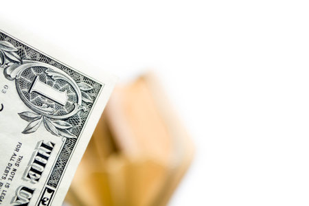 The edge of the dollar against the background of an empty wallet.の写真素材