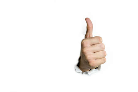 Thumb at the top on a white background.の写真素材
