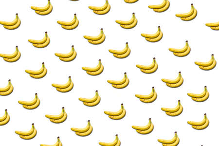 a pattern of bananas on a white background, a bunch of bananas.の写真素材