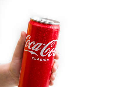 Coca Cola in the hands of a child on a white background.Kazakhstan SKO 03.03.2022のeditorial素材