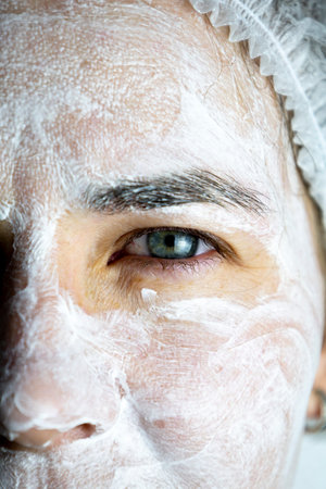Cream mask on the face of the girl, rejuvenating face mask.の写真素材