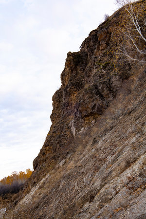 A sheer cliff on the Ishim River. Natural relief. Autumn landscape. High quality photoの写真素材