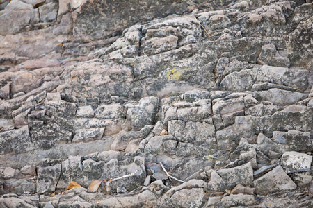 Rock layers - a colorful formations of rocks stacked over the hundreds of years. Interesting background with fascinating texture. High quality photoの写真素材