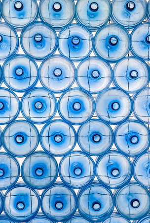 Empty PET bottles for drinking water 5 gallons (18.9 liters), stacked, vertical.の写真素材