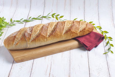 Rustic Bread Baguette in Wood Table