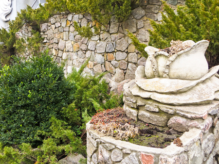 stone wall and bushesの写真素材