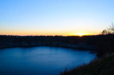 View on a lake in a granite quarryの写真素材