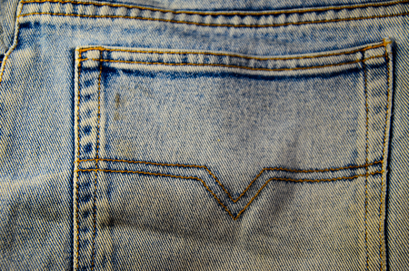 Pocket of the blue jeans.  Fabric backgroundの写真素材