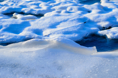 Texture of the white fluffy snow for backgroundの写真素材