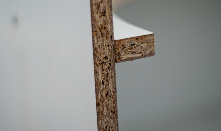 Details of the chipboard futniture. Woodworking and carpentryの写真素材