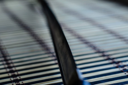 Japanese sword katana on a bamboo mat. Selective focus