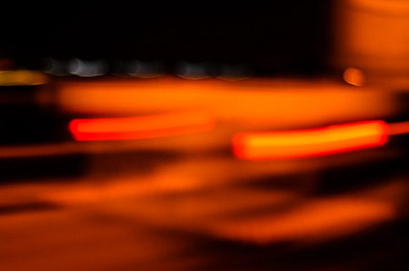 Trails of the car lights on night roadの写真素材