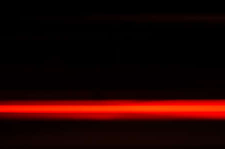 Trails of the car lights on night roadの写真素材