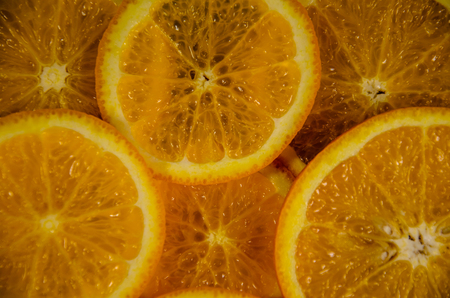 Background of the orange slices. Top viewの写真素材
