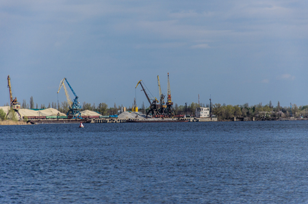 Cranes in cargo port on river Dnieper in Kremenchug, Ukraineのeditorial素材