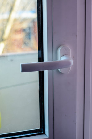 Handle of the modern pvc window. Close-upの写真素材