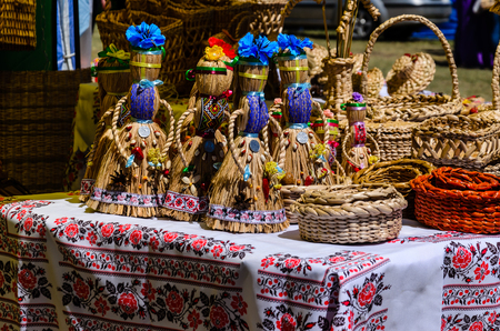Different wicker products for sale on a peasant fairの写真素材